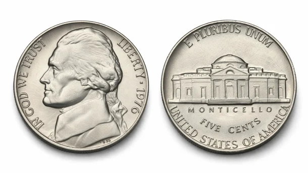Obverse and reverse of a 1976 Jefferson nickel with clear Monticello detail.
